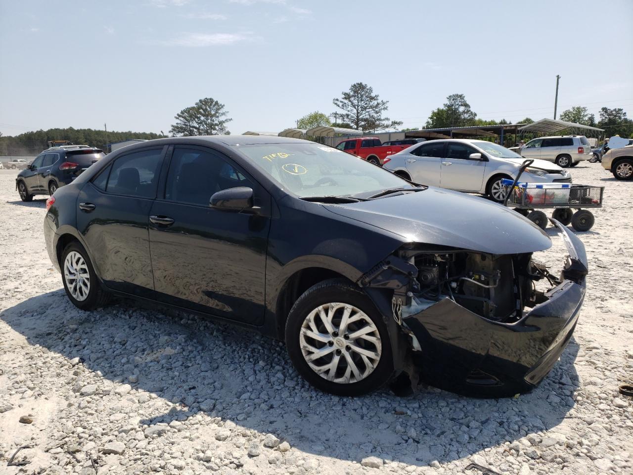 TOYOTA COROLLA L 2017 with VIN 5YFBURHE4HP724647 - Photo from auction
