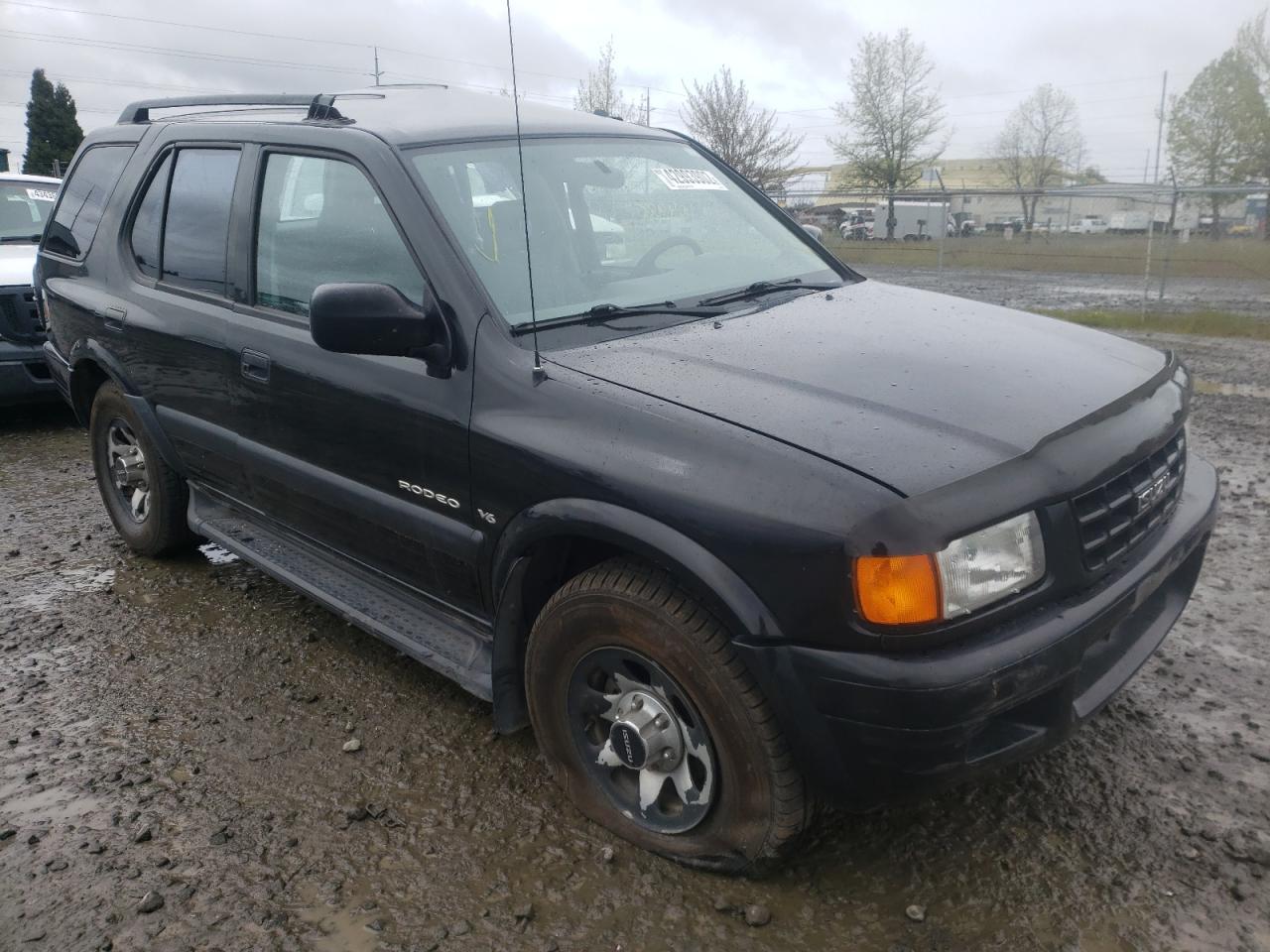 ISUZU RODEO S 1998 with VIN 4S2CM58W8W4363899 - Photo from auction