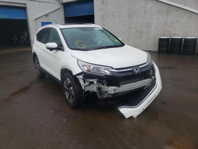 HONDA CR-V TOURI 2016 with VIN 5J6RM4H90GL093983 - Photo from auction