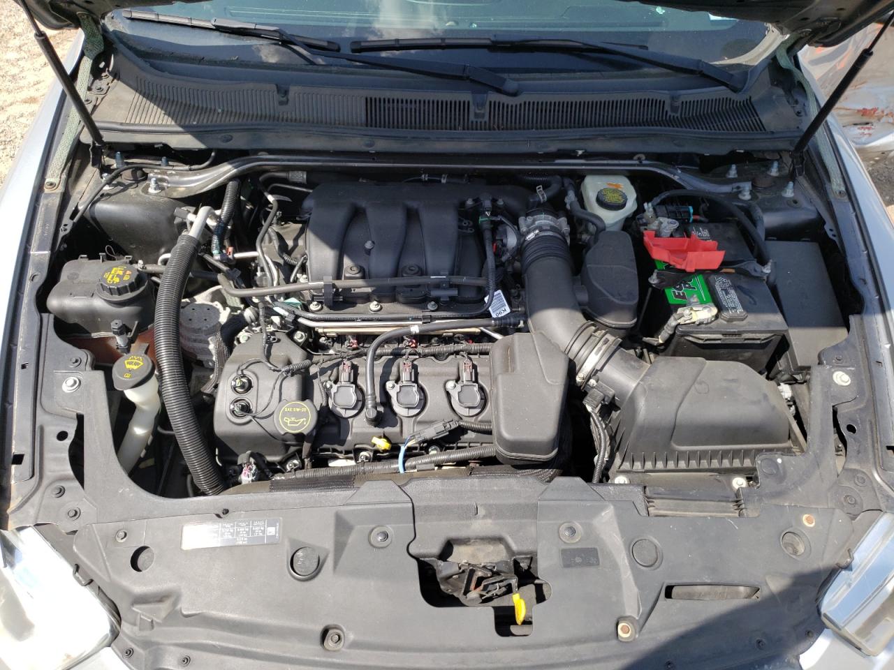 Photo 7 from auction – 2014 FORD TAURUS POL with VIN 1FAHP2MK4EG153703