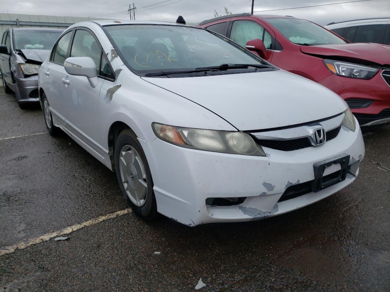 HONDA CIVIC HYBR 2010 with VIN JHMFA3F22AS007828 - Photo from auction