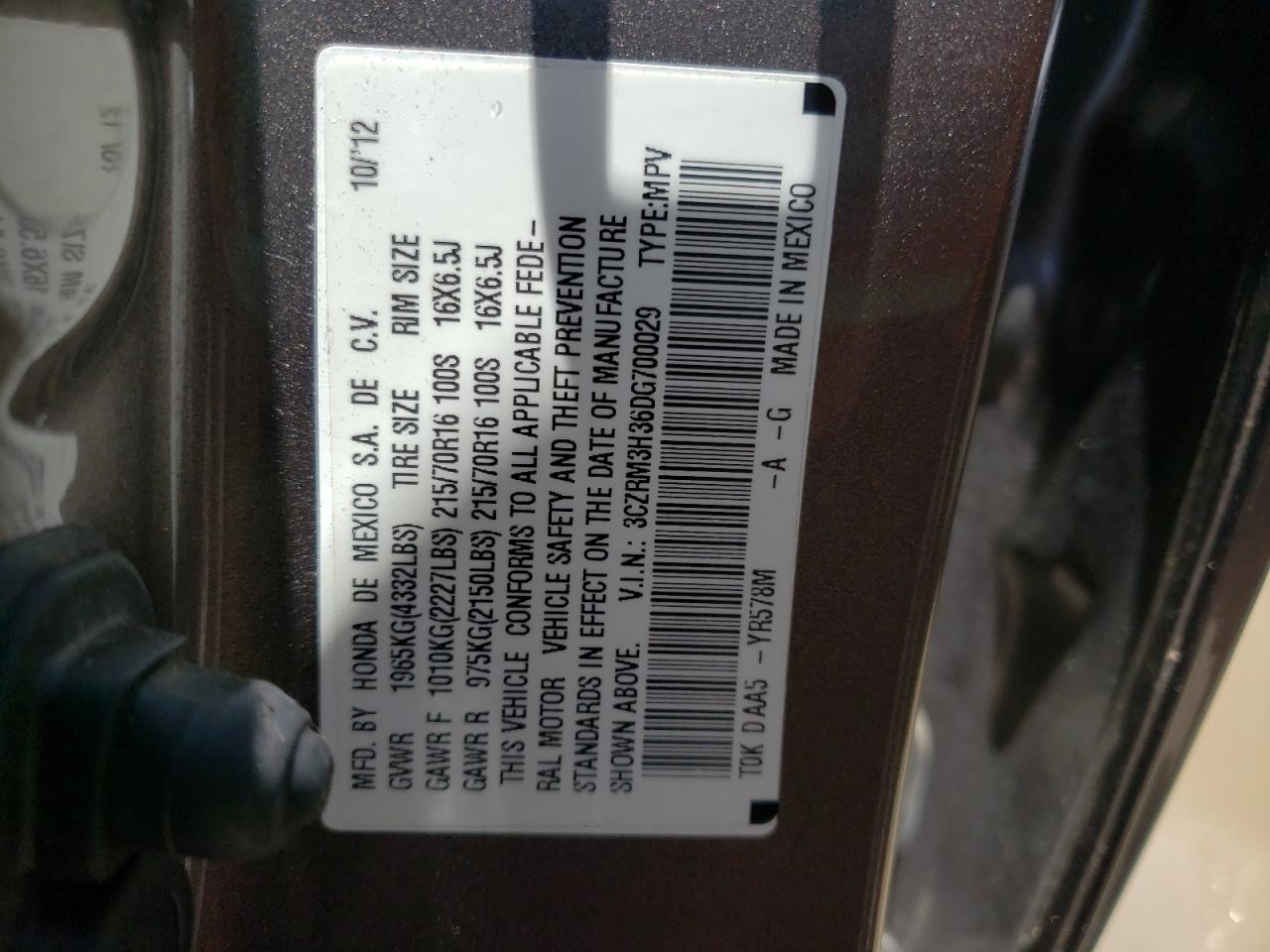 Photo 10 from auction – 2013 HONDA CR-V LX with VIN 3CZRM3H36DG700029