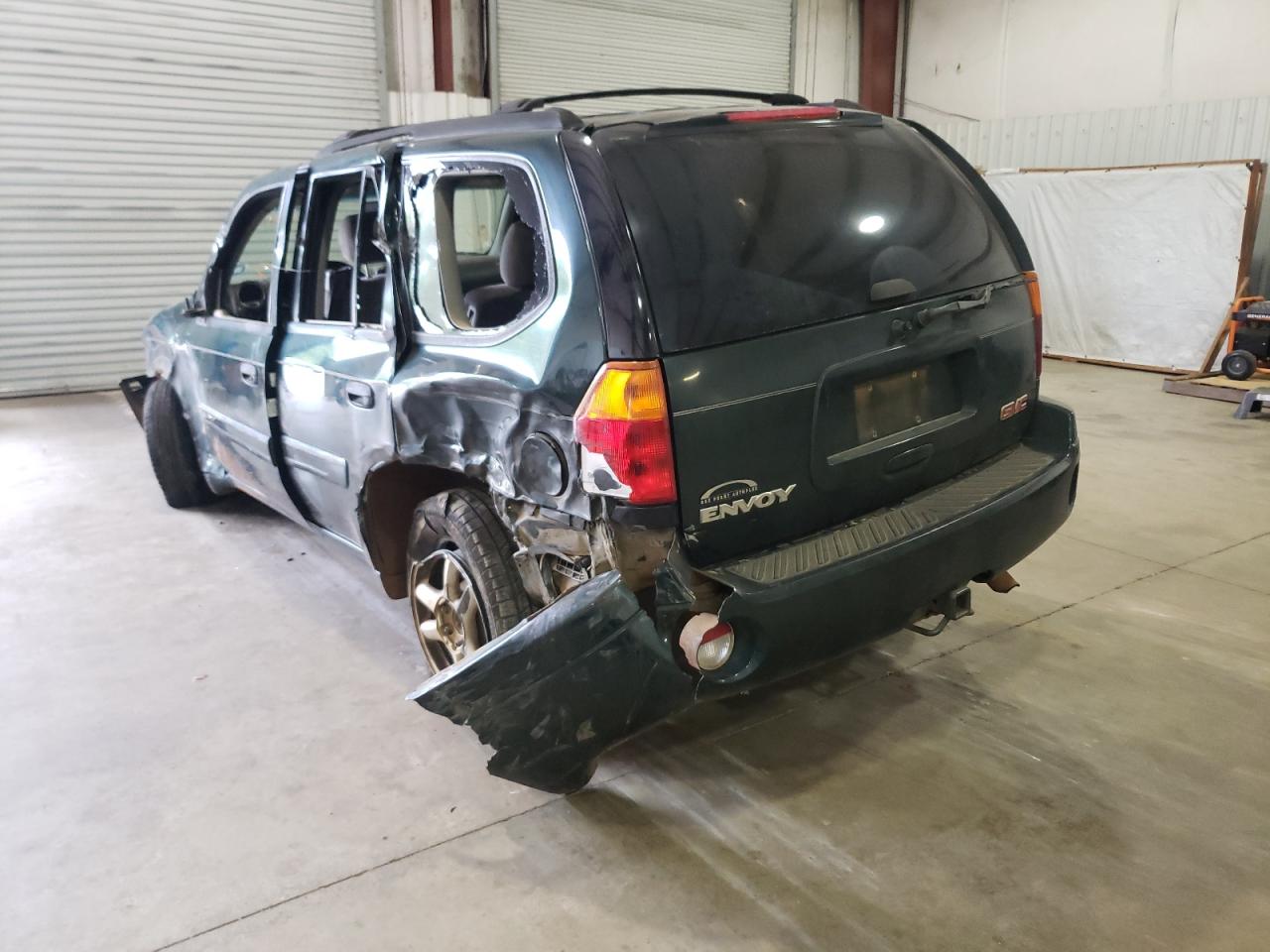 Photo 3 from auction – 2004 GMC ENVOY with VIN 1GKDS13S242125241