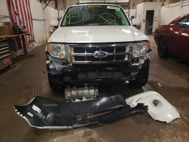 Photo 9 from auction – 2009 FORD ESCAPE LIM with VIN 1FMCU04G79KC31421
