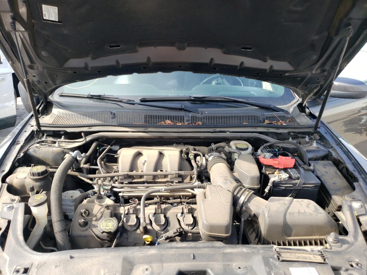 Photo 7 from auction – 2015 FORD TAURUS SEL with VIN 1FAHP2H81FG181605