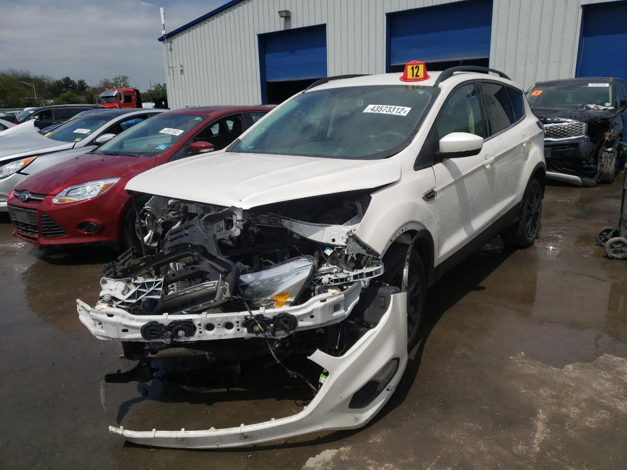 Photo 2 from auction – 2017 FORD ESCAPE SE with VIN 1FMCU0GD6HUA44983