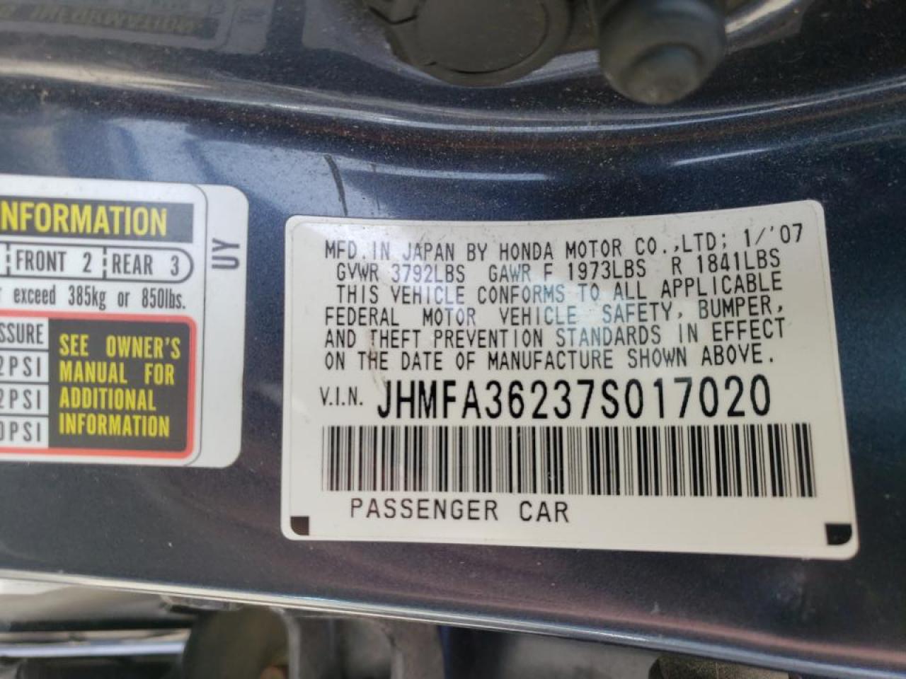 Photo 10 from auction – 2007 HONDA CIVIC HYBR with VIN JHMFA36237S017020