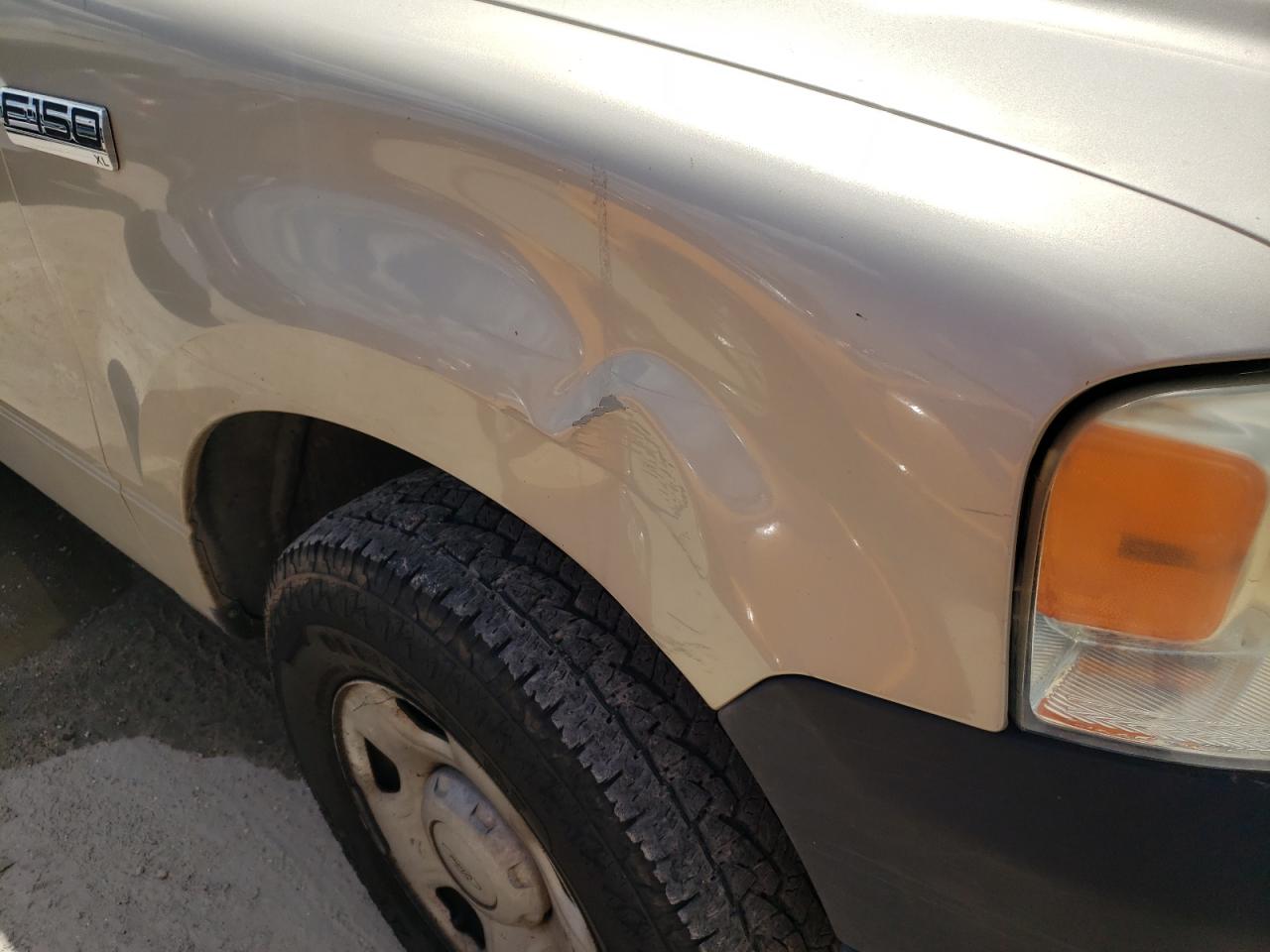 Photo 9 from auction – 2007 FORD F150 with VIN 1FTRF12207KD60314