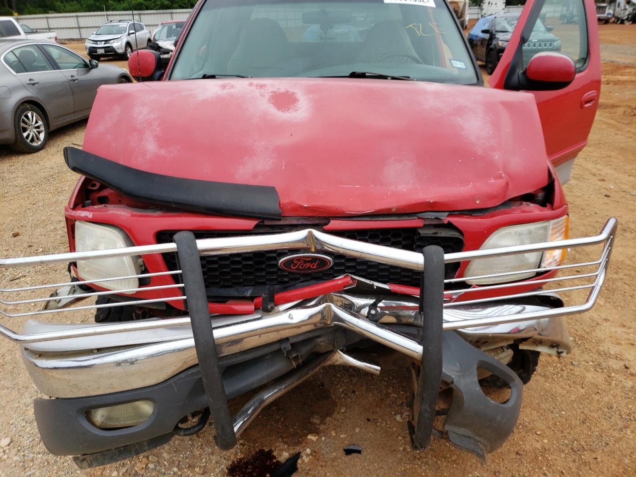 Photo 7 from auction – 2000 FORD F150 with VIN 1FTRX18L6YNA71628