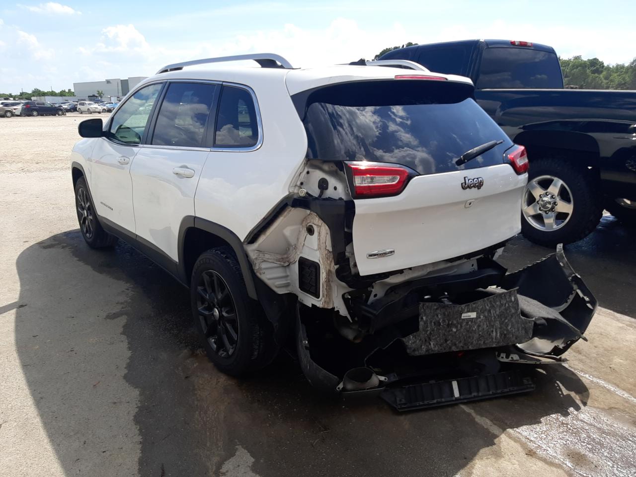 Photo 3 from auction – 2015 JEEP CHEROKEE L with VIN 1C4PJLCS1FW590239