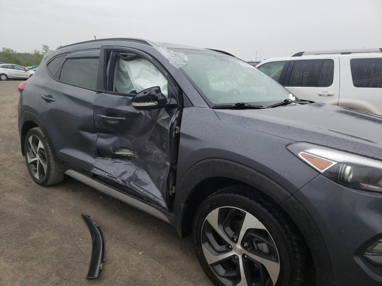 Photo 9 from auction – 2017 HYUNDAI TUCSON LIM with VIN KM8J3CA24HU552274