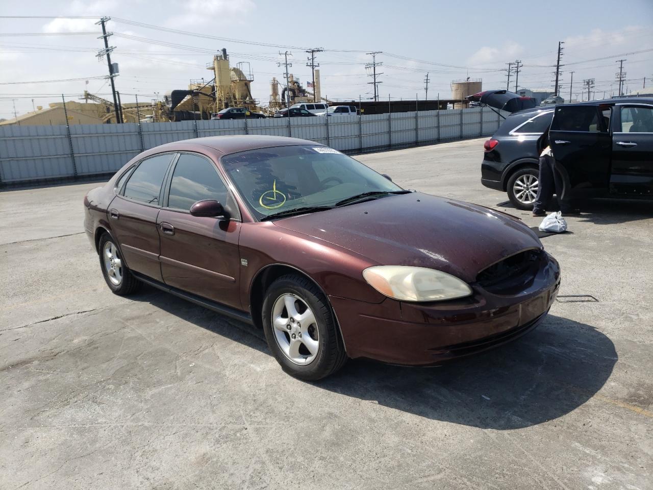 FORD TAURUS SES 2001 with VIN 1FAFP55S31G165228 - Photo from auction