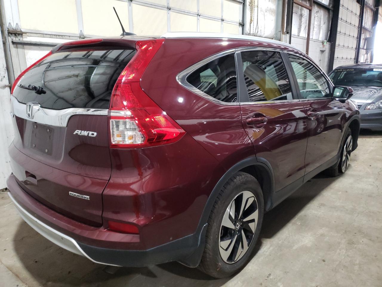 Photo 4 from auction – 2016 HONDA CR-V TOURI with VIN 5J6RM4H99GL084148