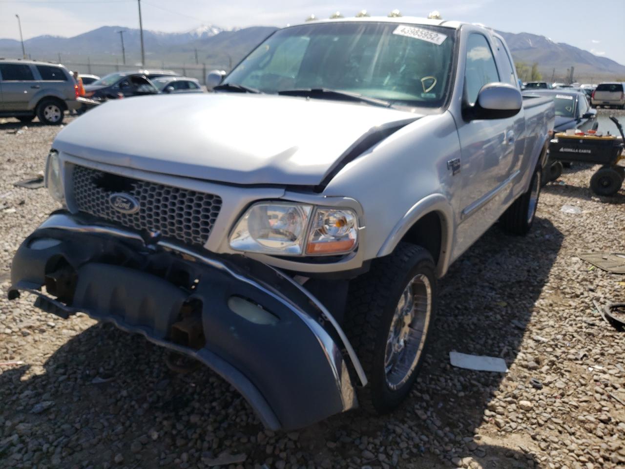 Photo 2 from auction – 1999 FORD F150 with VIN 1FTRX18W3XKA04804