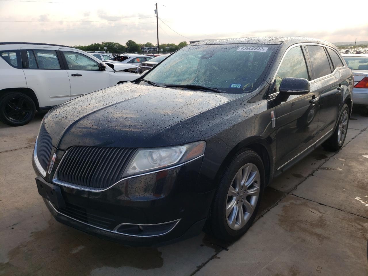 Photo 2 from auction – 2014 LINCOLN MKT with VIN 2LMHJ5AT3EBL53053