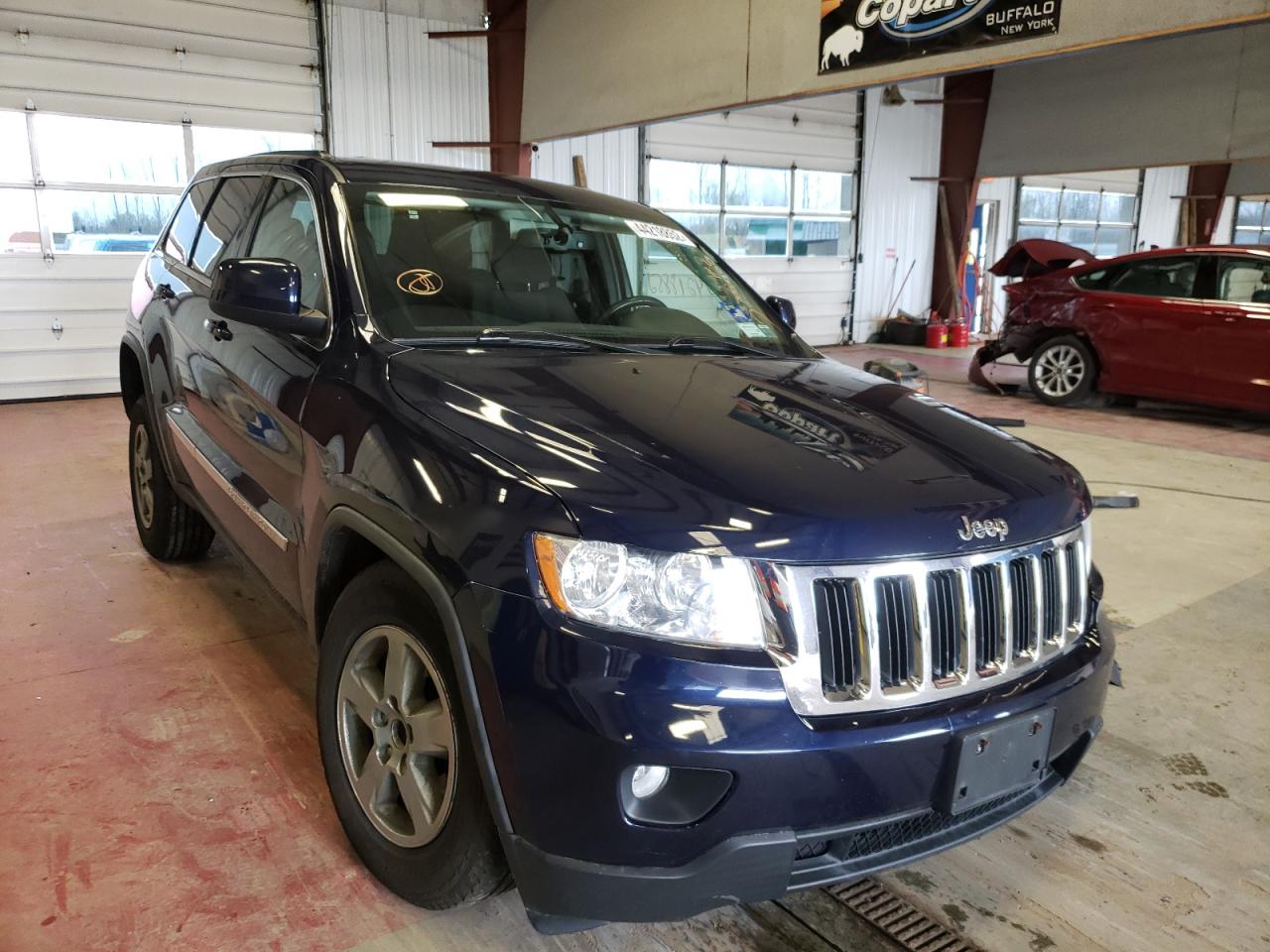 JEEP GRAND CHER 2012 with VIN 1C4RJFAG1CC218728 - Photo from auction