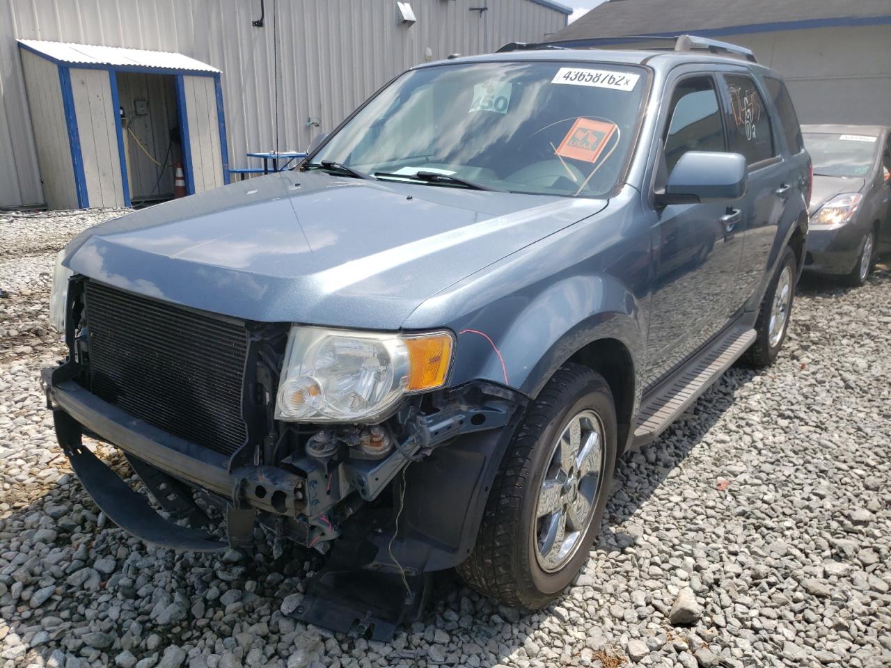 Photo 2 from auction – 2011 FORD ESCAPE LIM with VIN 1FMCU9EG4BKB57125