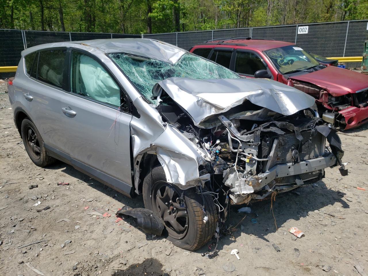 TOYOTA RAV4 LE 2018 with VIN 2T3ZFREV0JW509470 - Photo from auction
