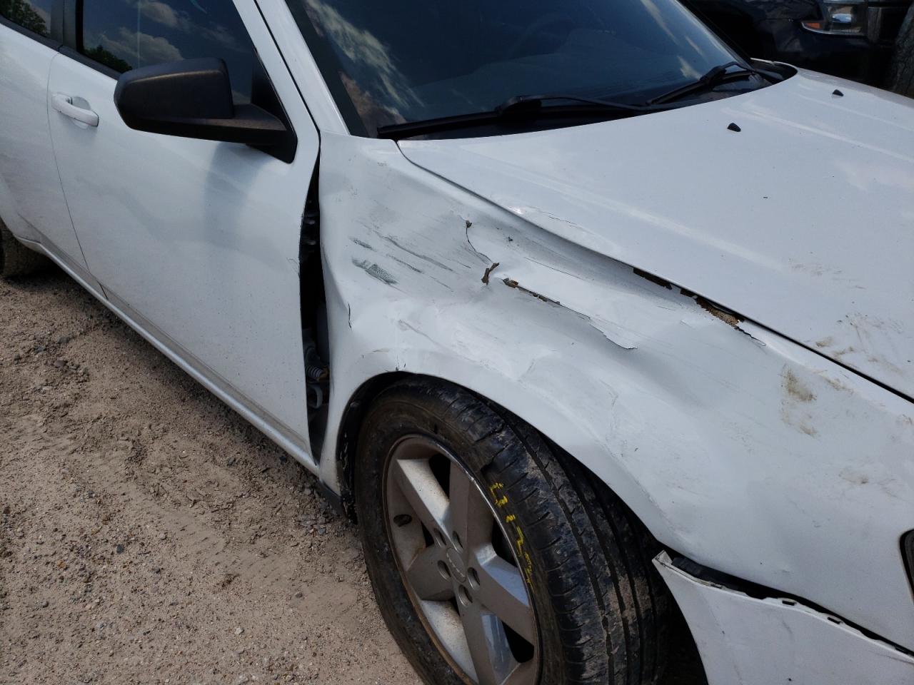 Photo 9 from auction – 2013 DODGE AVENGER SE with VIN 1C3CDZAB4DN652199