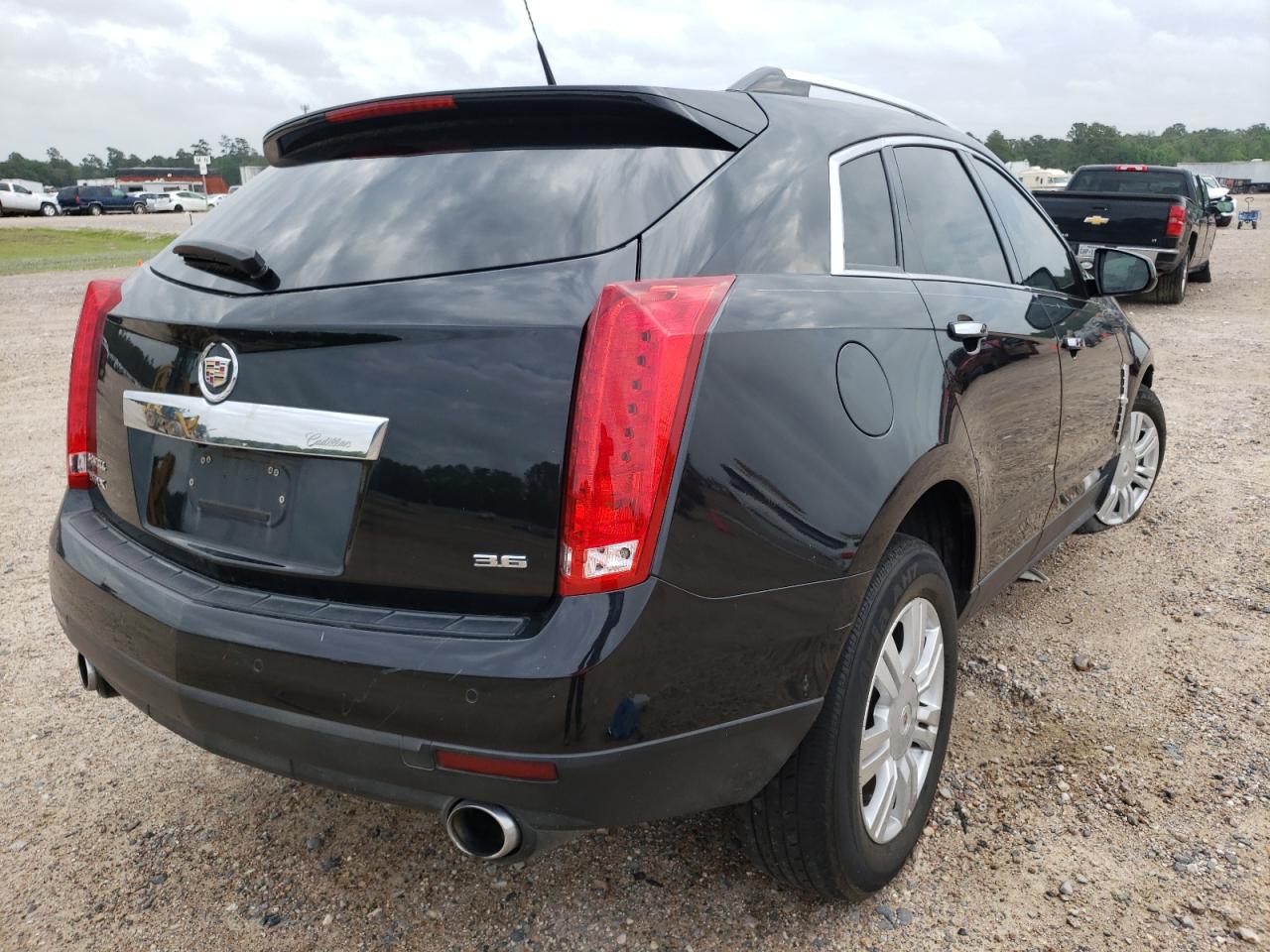 Photo 4 from auction – 2012 CADILLAC SRX LUXURY with VIN 3GYFNAE30CS511669