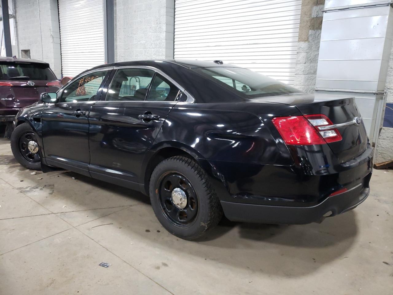 Photo 3 from auction – 2013 FORD TAURUS POL with VIN 1FAHP2M8XDG157760
