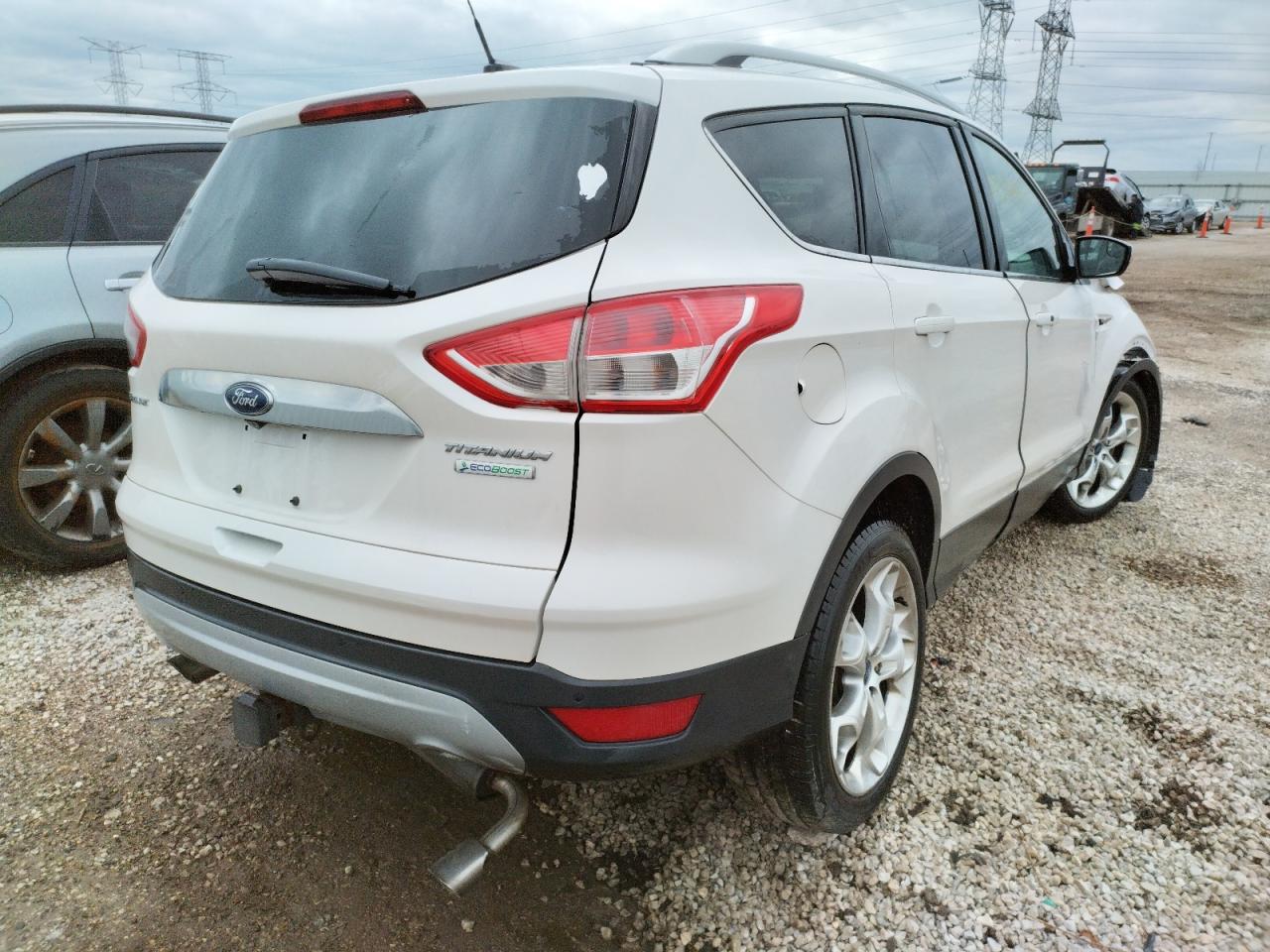 Photo 4 from auction – 2015 FORD ESCAPE TIT with VIN 1FMCU0J94FUA04743