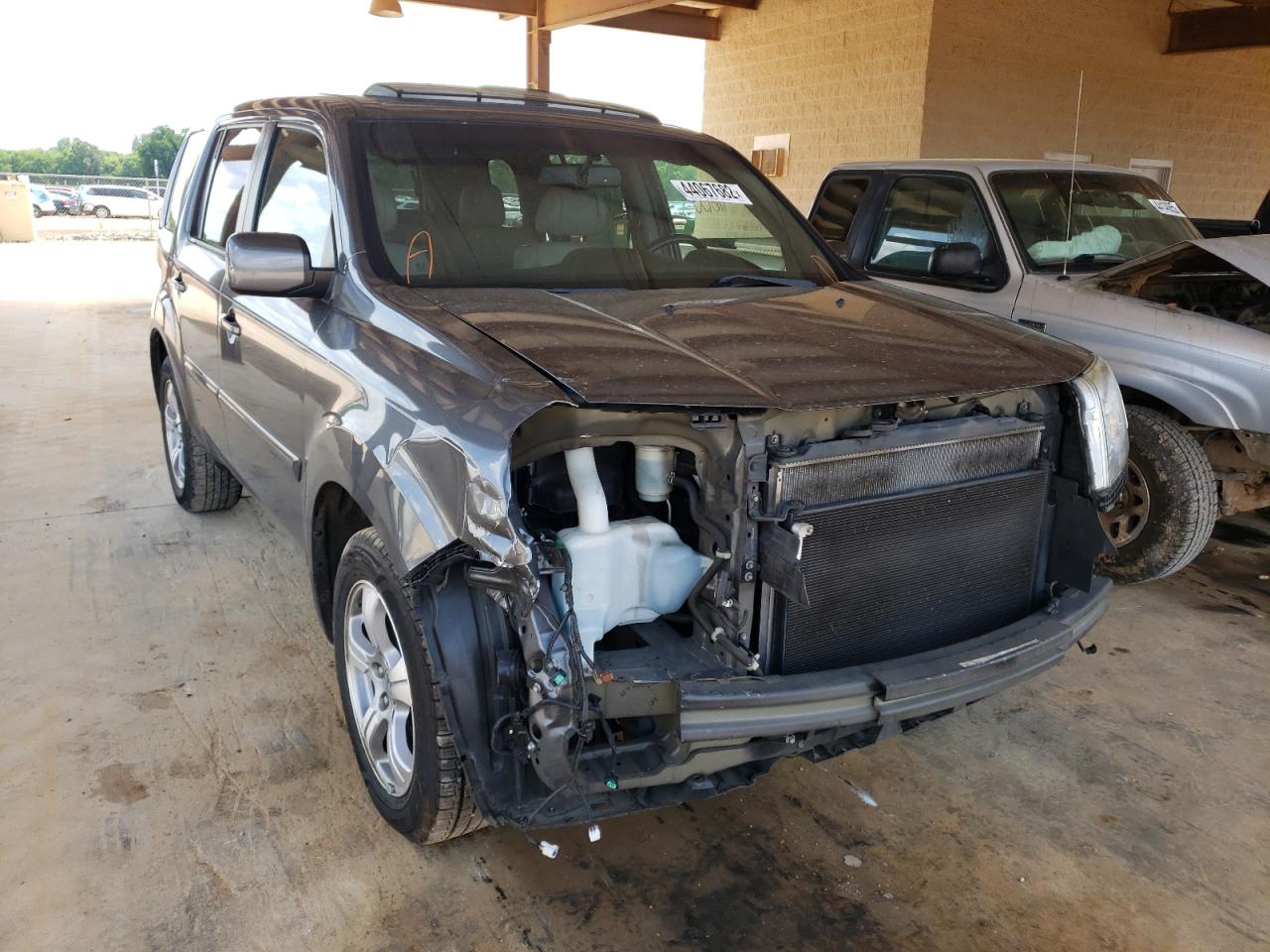 HONDA PILOT EXL 2012 with VIN 5FNYF3H59CB037055 - Photo from auction