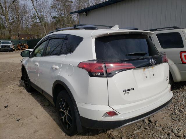 Photo 3 from auction – 2018 TOYOTA RAV4 SE with VIN JTMJFREV8JJ245684