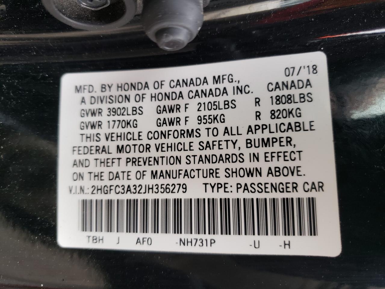 Photo 11 from auction – 2018 HONDA CIVIC EX with VIN 2HGFC3A32JH356279