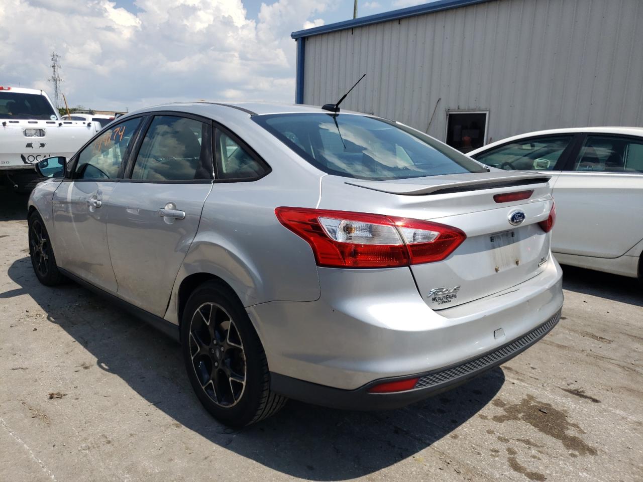 Photo 3 from auction – 2013 FORD FOCUS SE with VIN 1FADP3F21DL312040