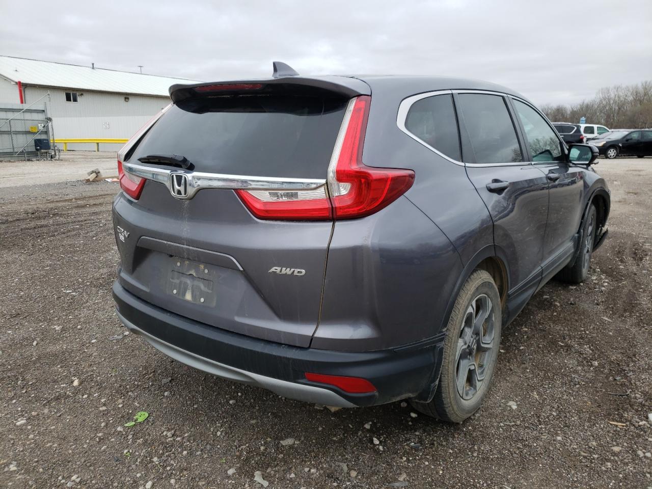Photo 4 from auction – 2017 HONDA CR-V EXL with VIN 5J6RW2H86HL037523