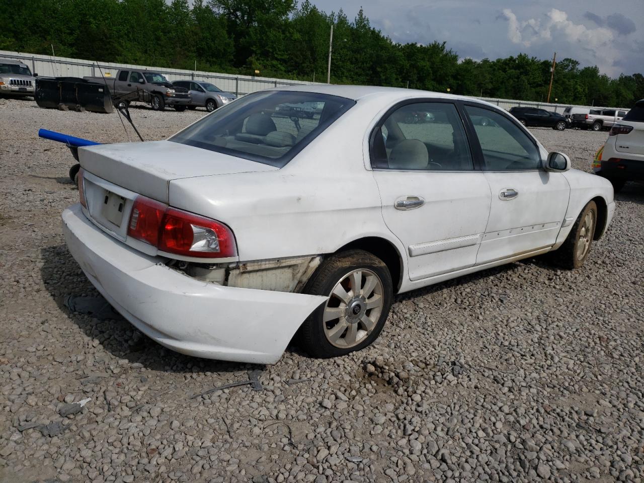 Photo 4 from auction – 2006 KIA OPTIMA LX with VIN KNAGD128565437089