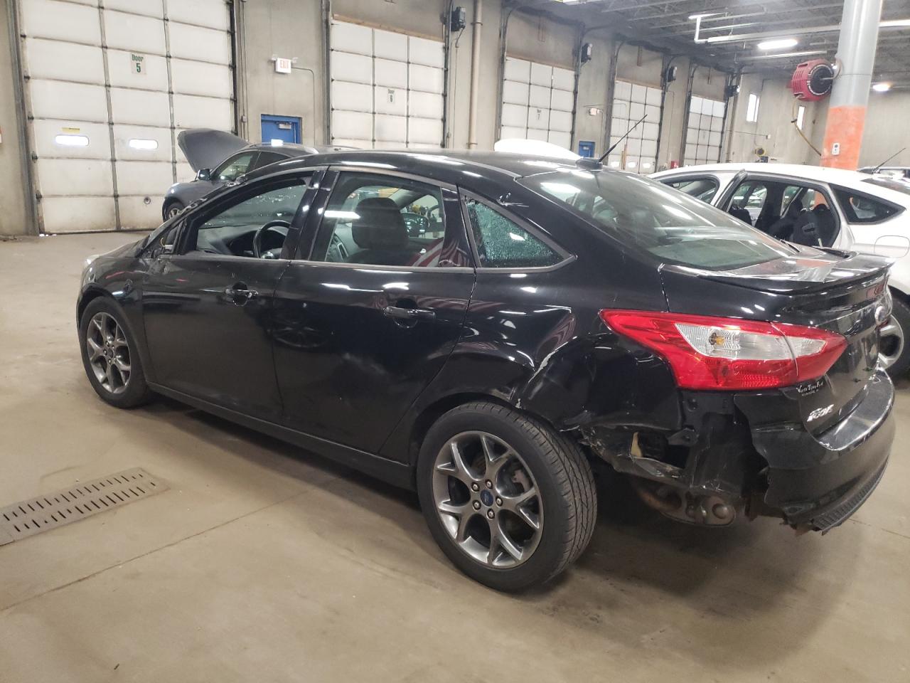Photo 9 from auction – 2014 FORD FOCUS SE with VIN 1FADP3F28EL347689
