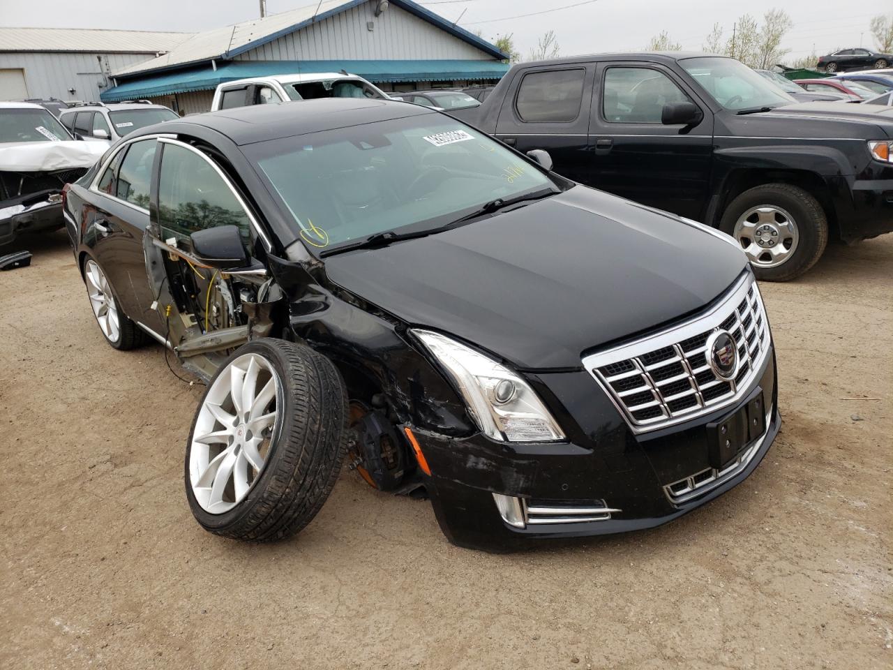 CADILLAC XTS PREMIU 2013 with VIN 2G61T5S32D9217662 - Photo from auction