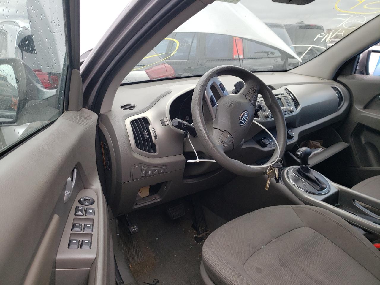Photo 9 from auction – 2011 KIA SPORTAGE L with VIN KNDPBCA28B7084671