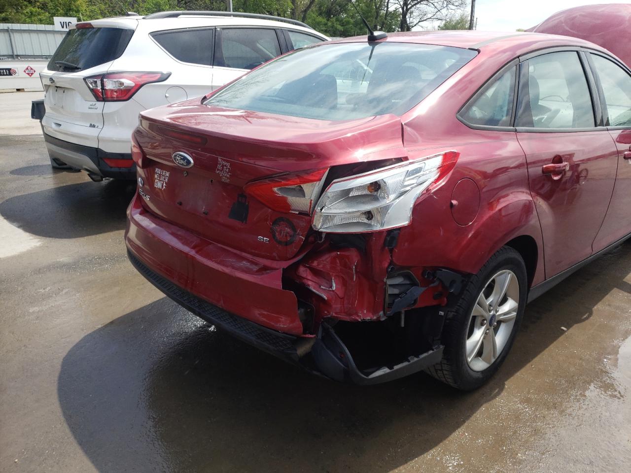 Photo 9 from auction – 2013 FORD FOCUS SE with VIN 1FADP3F21DL258772