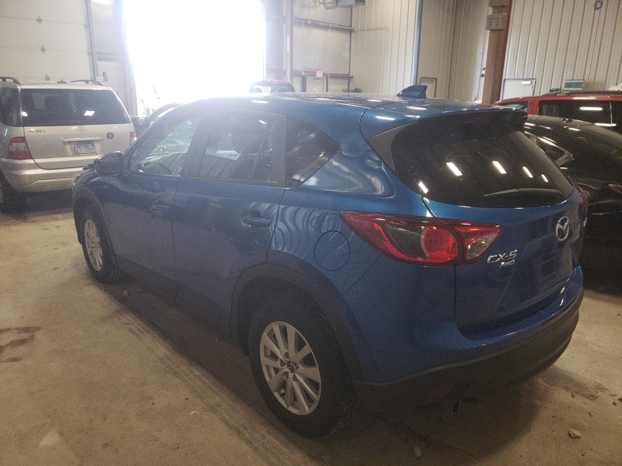 Photo 3 from auction – 2013 MAZDA CX-5 TOURI with VIN JM3KE4CE7D0140200
