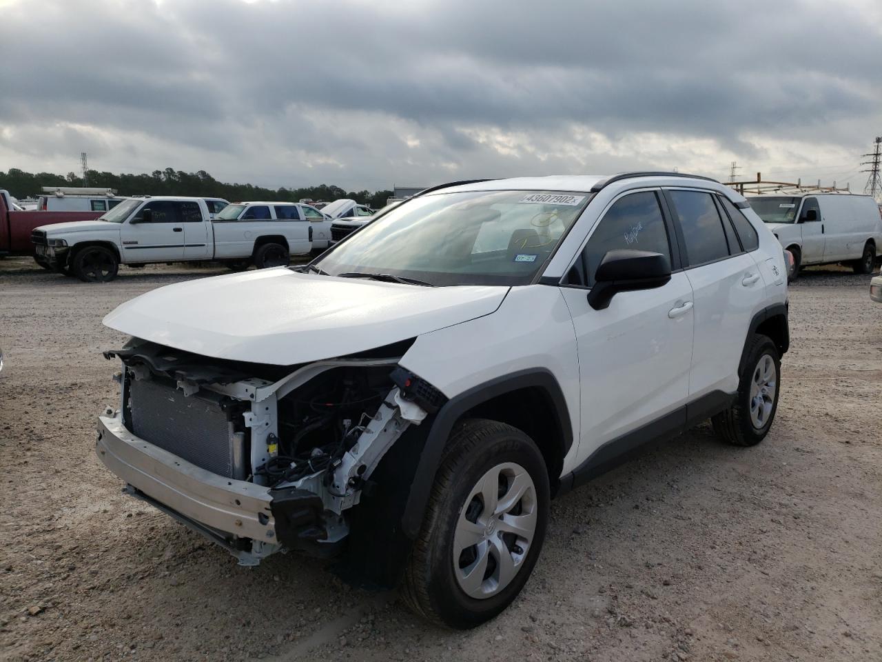 Photo 2 from auction – 2021 TOYOTA RAV4 LE with VIN 2T3H1RFV3MC154650