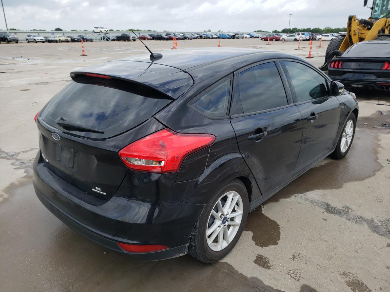 Photo 4 from auction – 2016 FORD FOCUS SE with VIN 1FADP3K21GL244767