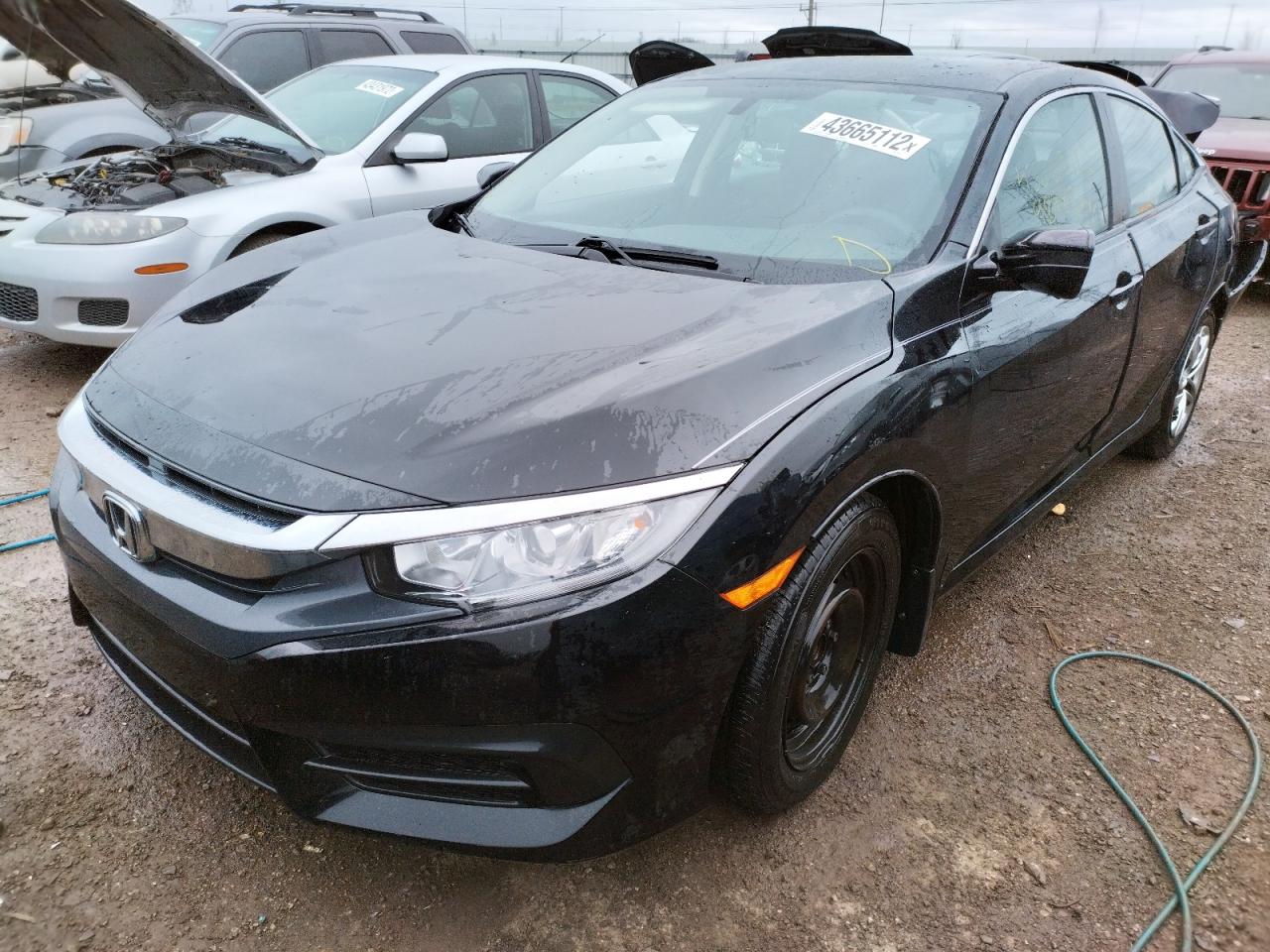 Photo 2 from auction – 2016 HONDA CIVIC LX with VIN 19XFC2F50GE003322