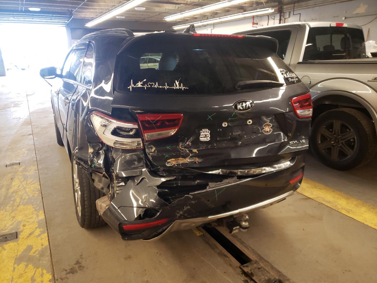Photo 9 from auction – 2018 KIA SORENTO SX with VIN 5XYPKDA56JG385103