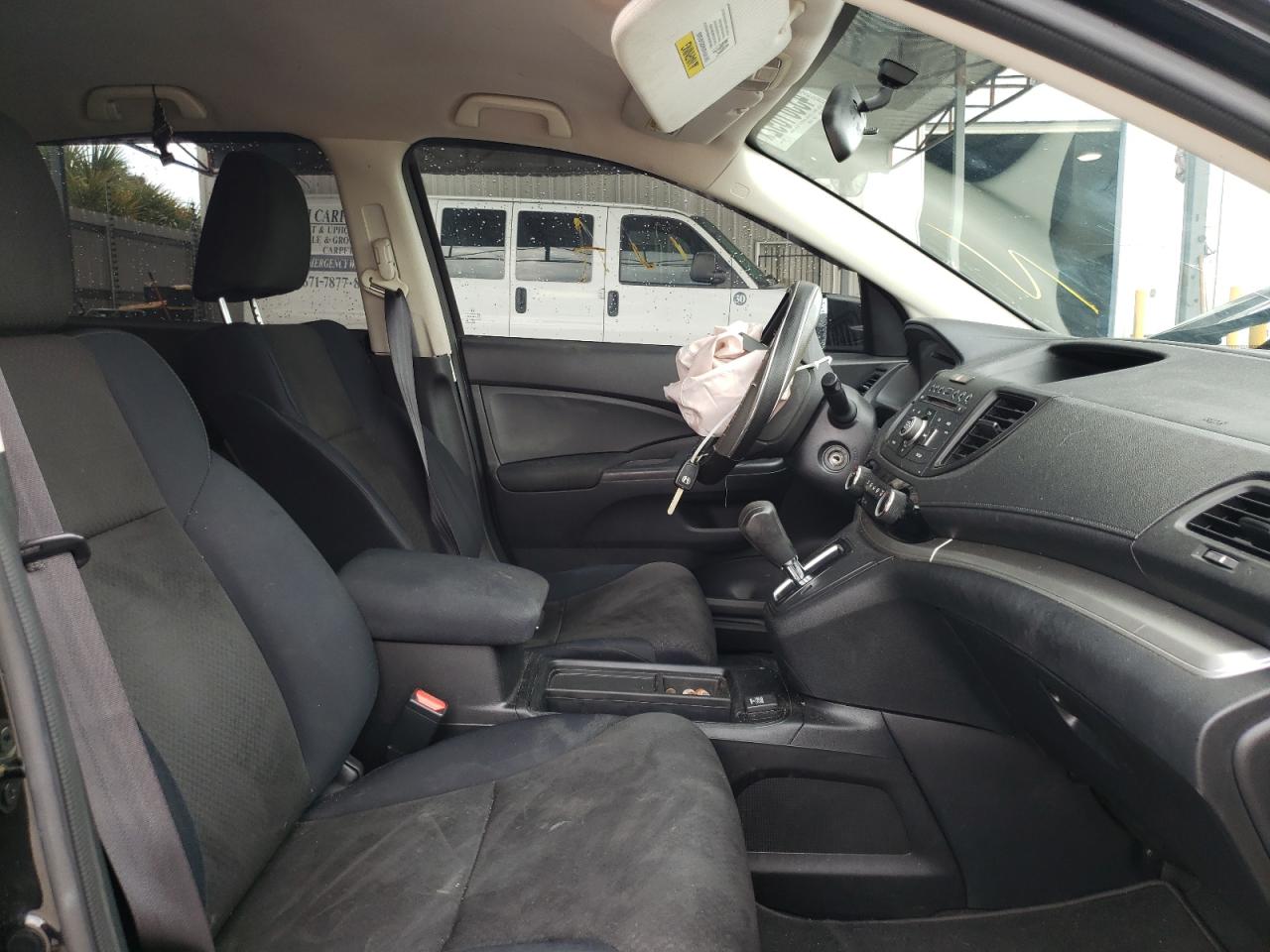 Photo 5 from auction – 2016 HONDA CR-V LX with VIN 2HKRM3H36GH554765