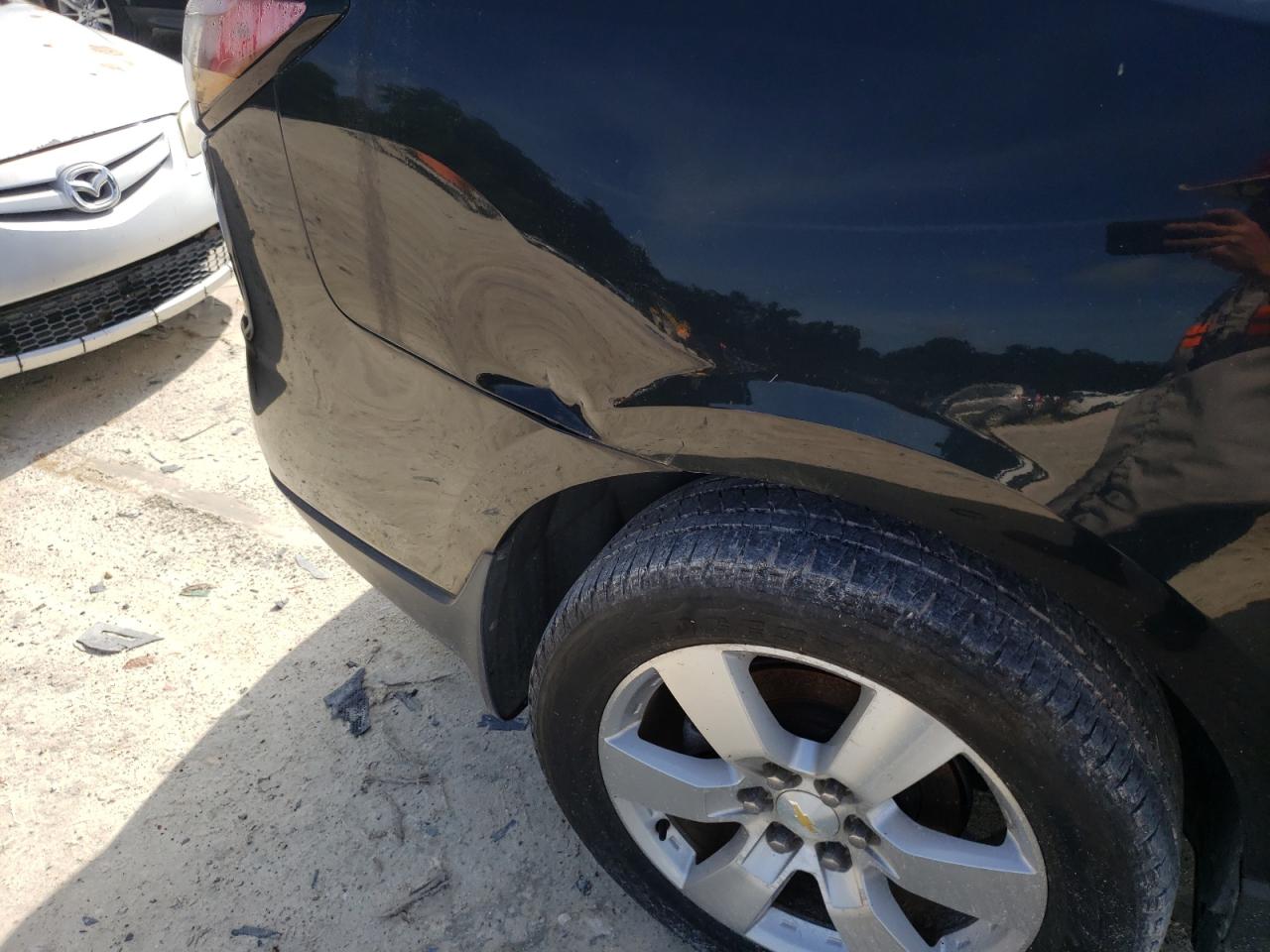 Photo 9 from auction – 2014 CHEVROLET TRAVERSE L with VIN 1GNKRJKD8EJ146482