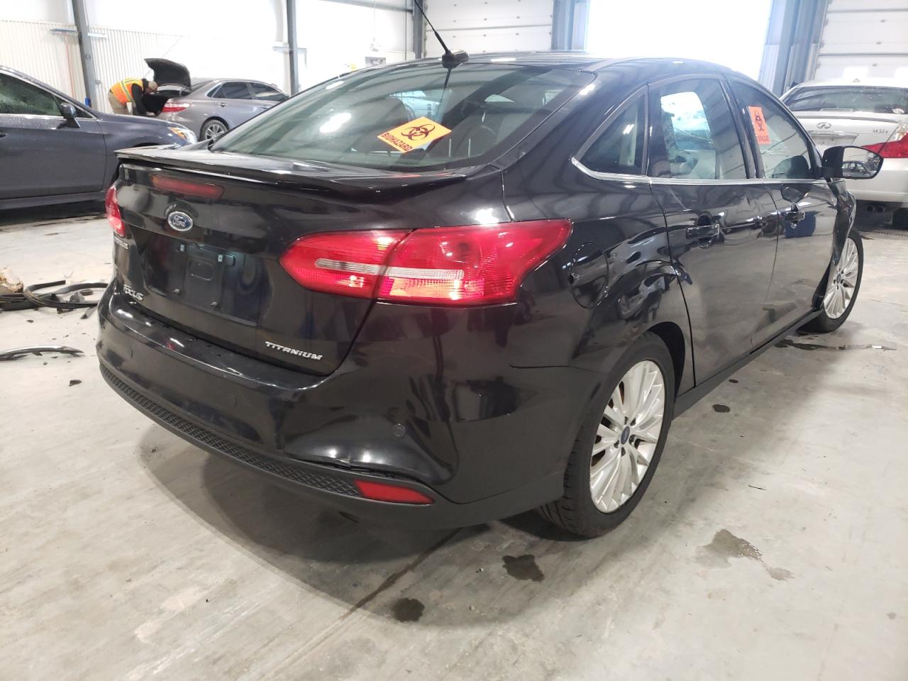 Photo 4 from auction – 2015 FORD FOCUS TITA with VIN 1FADP3J23FL292397