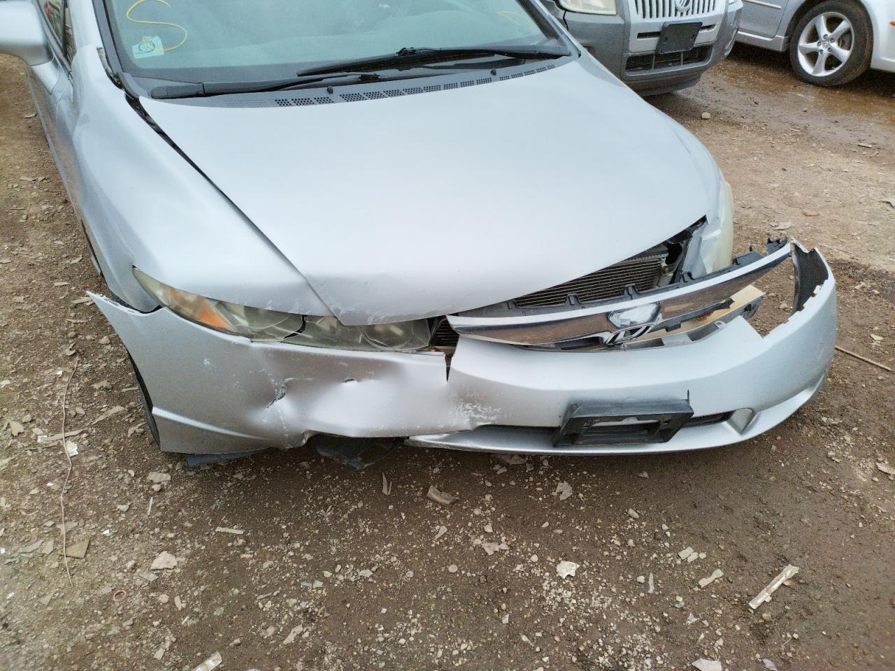 Photo 9 from auction – 2009 HONDA CIVIC LX with VIN 19XFA16599E048018