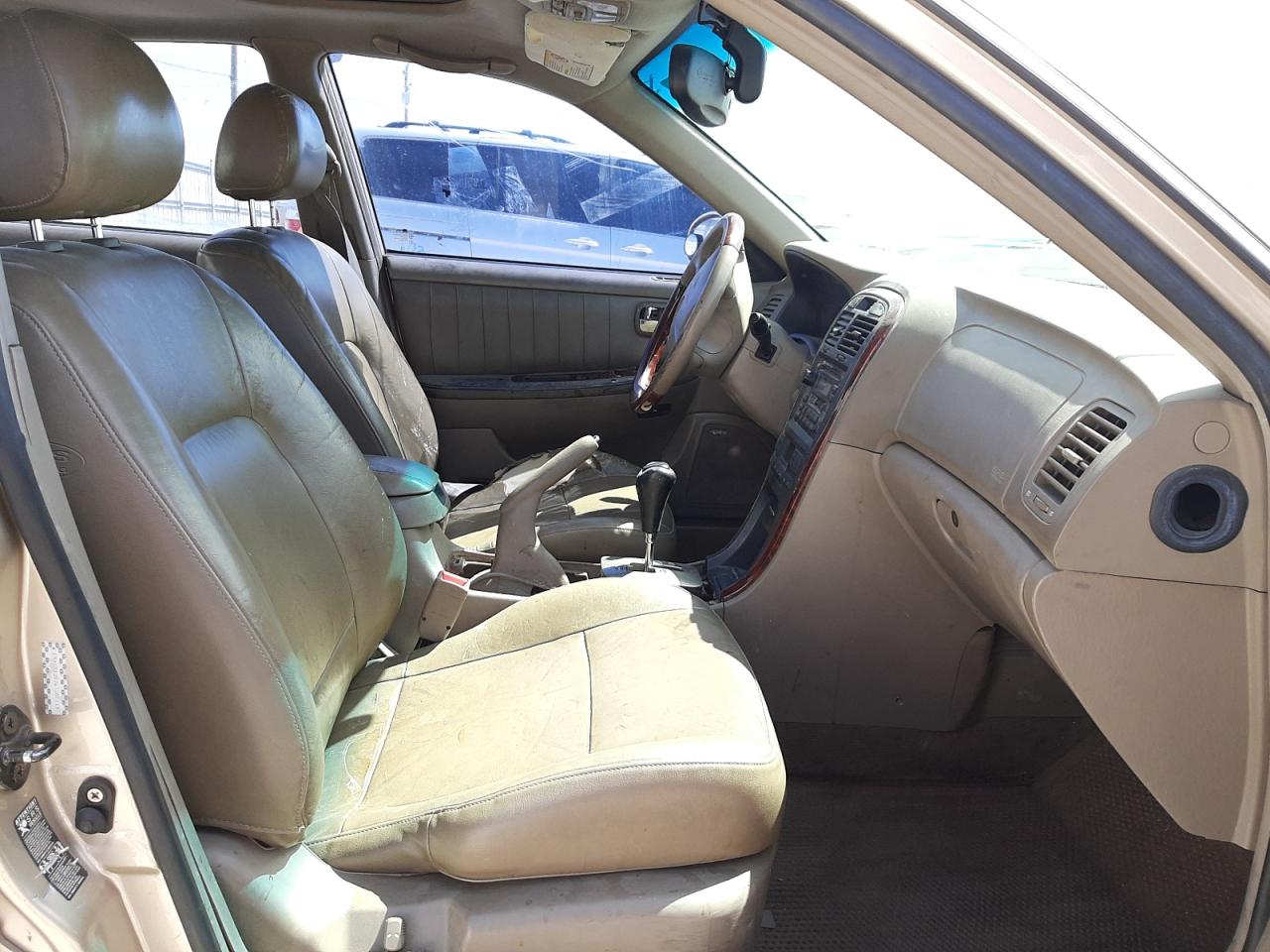 Photo 5 from auction – 2004 KIA OPTIMA LX with VIN KNAGD128245266119