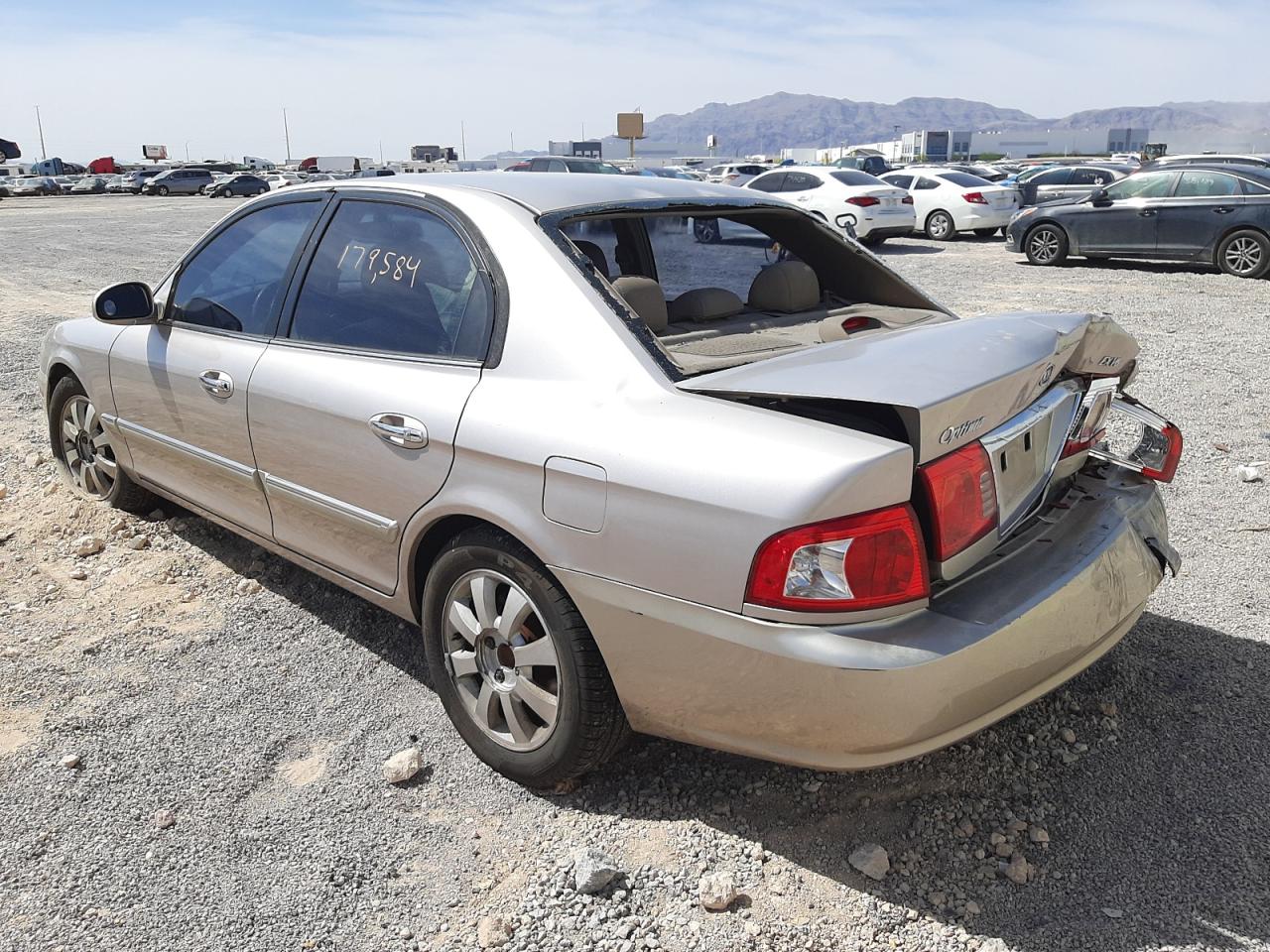 Photo 3 from auction – 2004 KIA OPTIMA LX with VIN KNAGD128245266119