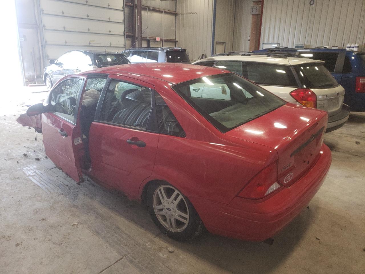 Photo 3 from auction – 2000 FORD FOCUS SE with VIN 1FAFP3434YW110169