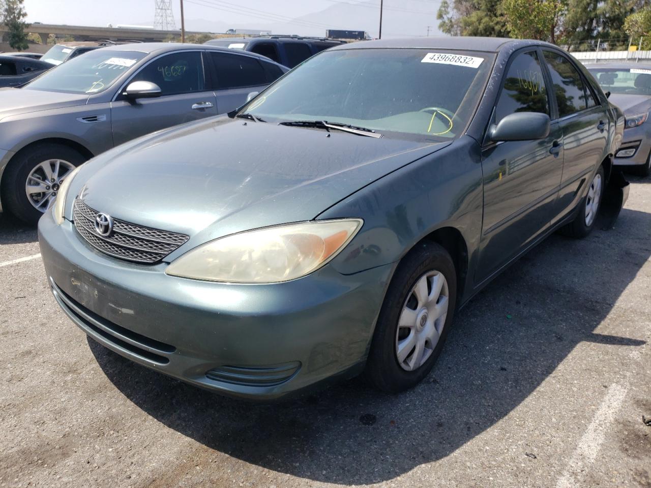 Photo 2 from auction – 2003 TOYOTA CAMRY LE with VIN 4T1BE32K13U716067