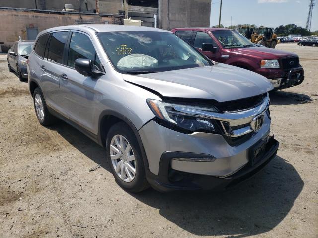 HONDA PILOT LX 2019 with VIN 5FNYF6H19KB069078 - Photo from auction